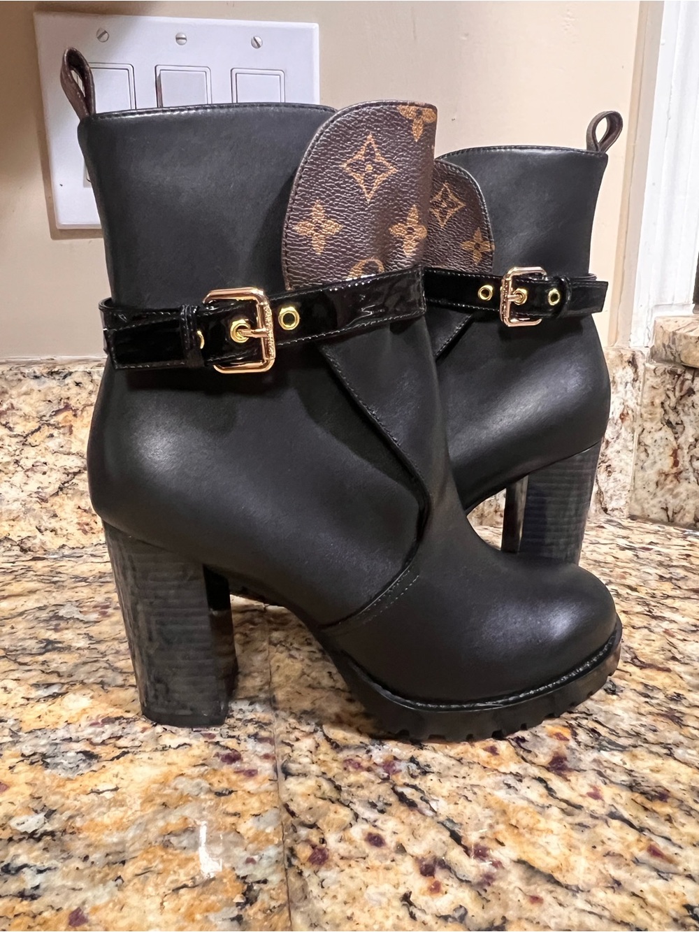 LV  Black High-Heel Ankle Boots with Gold Buckle